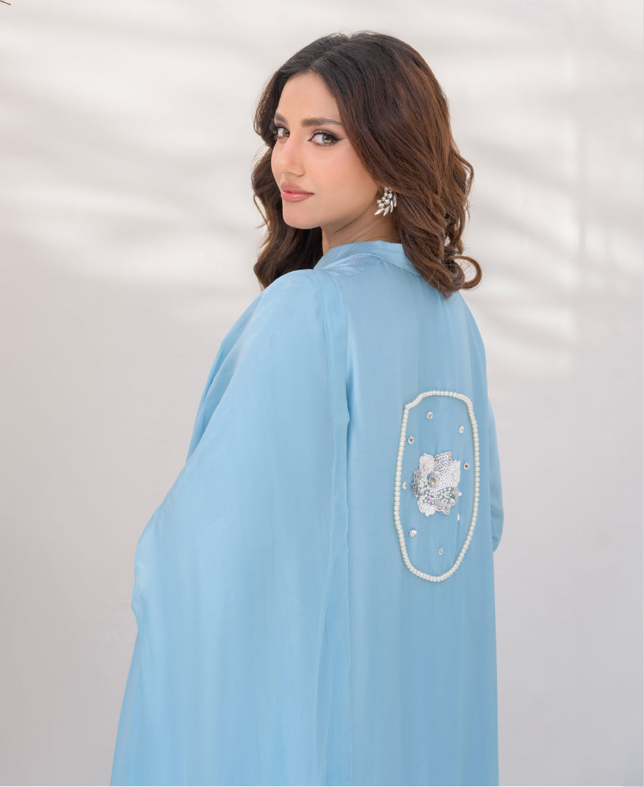 Blue raw silk designer ensemble pearl detailing on shirt back