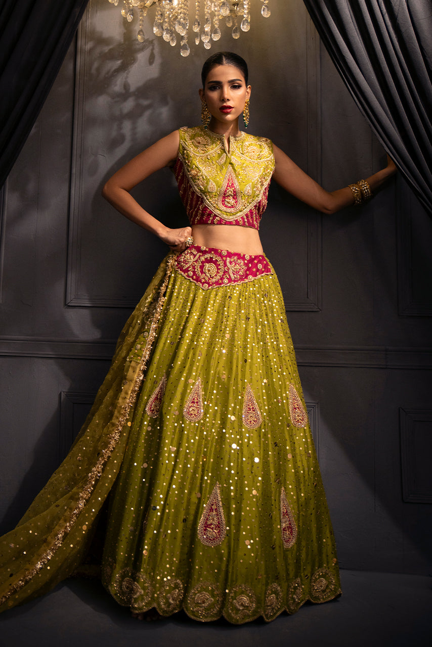 The handcrafted Zohra couture bodice is adorned with intricate zardozi, tilla, dabka, and artisanal embroidery designer bridal mehndi  lehnga.
