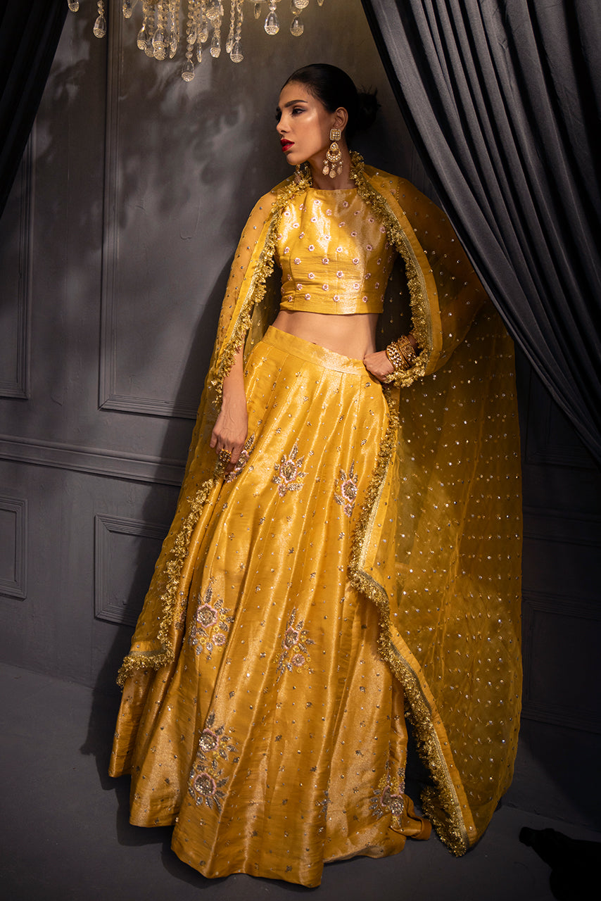 Zarmina designer bridal  mehndi dress with intricate hand embellishments and elegant silhouette.