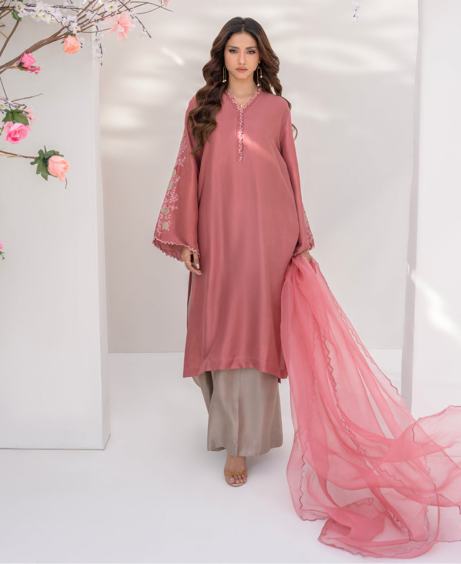  a pink traditional outfit with a ivory pant and dupatta